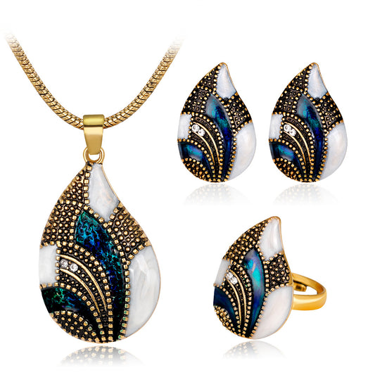 Ocean Mist Drop Jewelry Set featuring a teardrop pendant, earrings, and a ring with elegant stone detailing