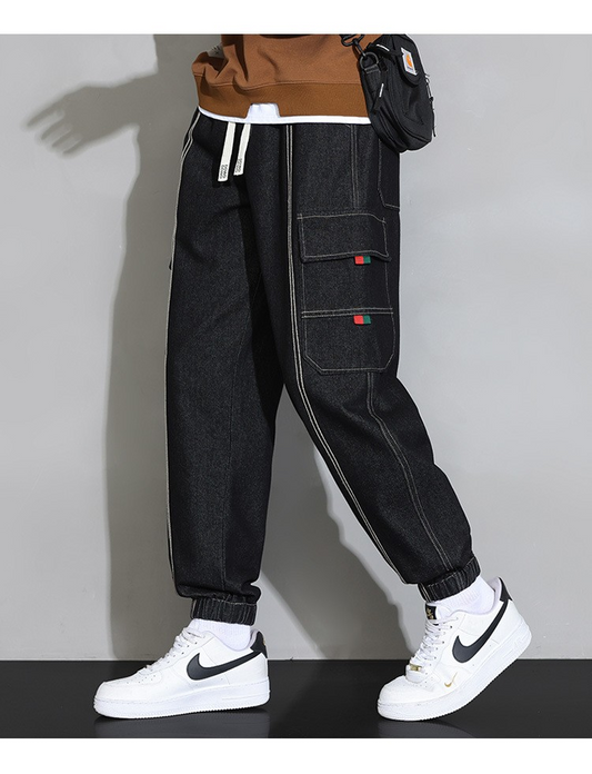 Retro men's utility denim pants in black with side cargo pockets and stylish design for a modern look