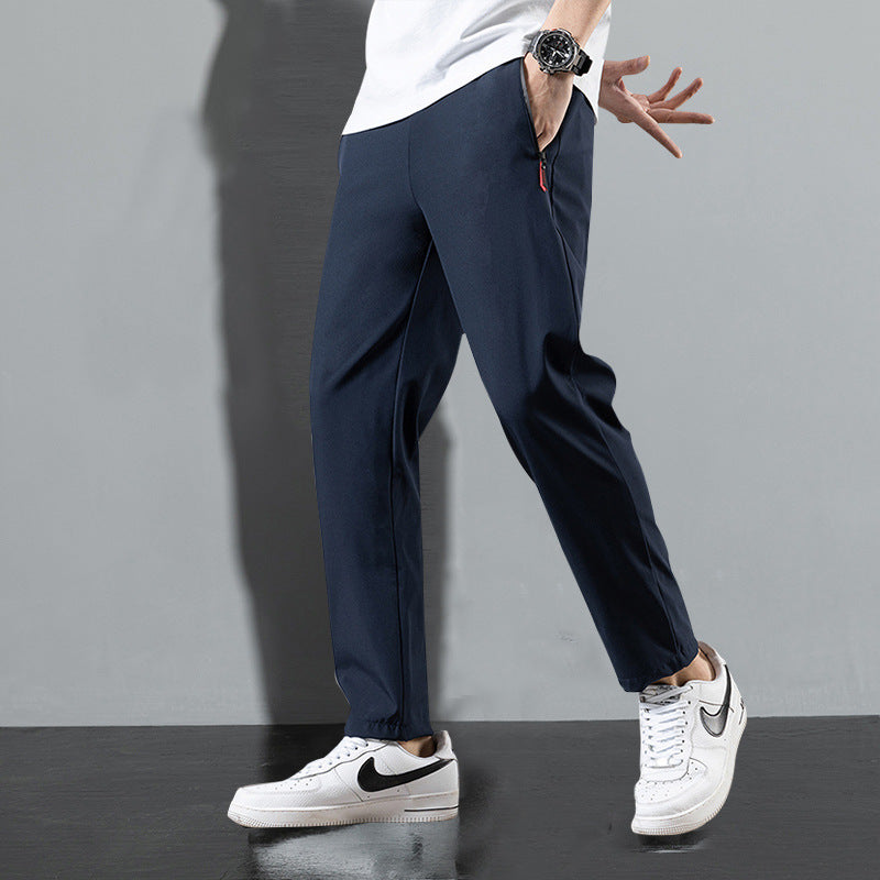 Stylish lightweight trousers in navy blue designed for comfort with a modern fit and side pockets