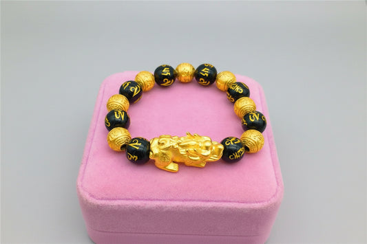 Stylish 3Sixty5 trendy gold bracelet with black beads and intricate lion design