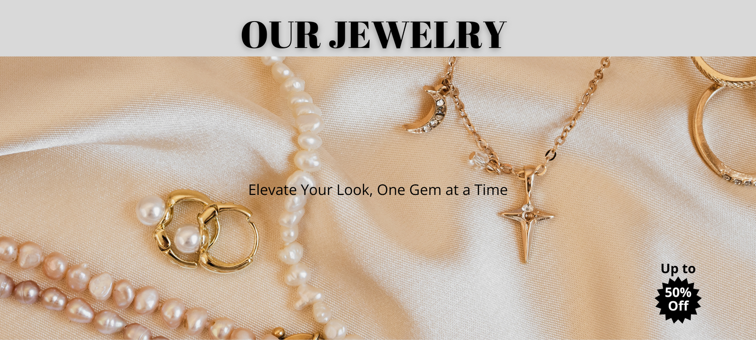 Dazzling collection of bold elegant jewelry including necklaces, rings, and bracelets on luxurious fabric