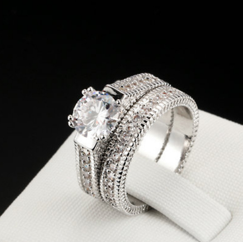 Stylish 3Sixty5 bold elegant diamond rings set in silver with intricate detailing and a central gemstone