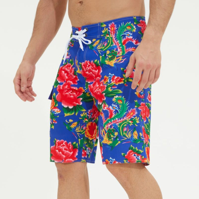 Bold summer swimwear for men featuring vibrant floral patterns and a comfortable fit
