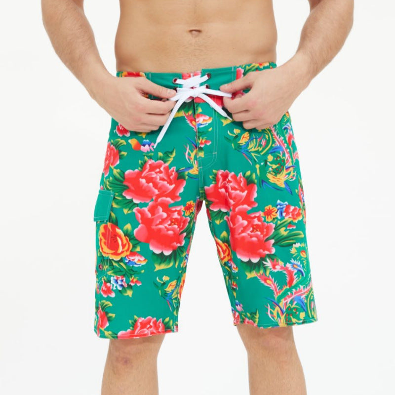 Stylish 3Sixty5 bold summer swimwear for men featuring vibrant floral patterns and adjustable drawstring