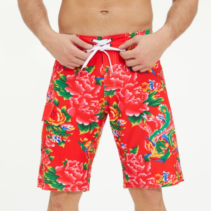 Bold summer swimwear for men featuring vibrant floral patterns and adjustable drawstring shorts