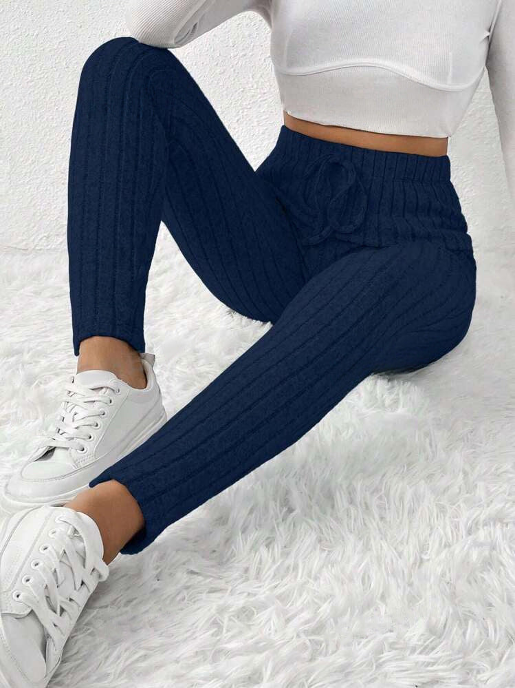 Stylish 3Sixty5 ChicStretch yoga pants in navy with a ribbed texture, perfect for workouts and casual wear