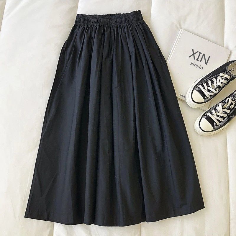 Stylish 3Sixty5 comfortable office skirt in black, designed for versatility and ease of wear.