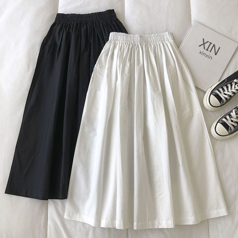 Stylish 3Sixty5 Comfortable office skirt in black and white with an elastic waistband for easy wear