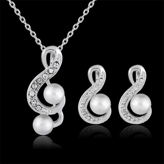 Danbi Pearl Jewelry Set featuring elegant necklace and matching earrings with pearls and sparkling accents