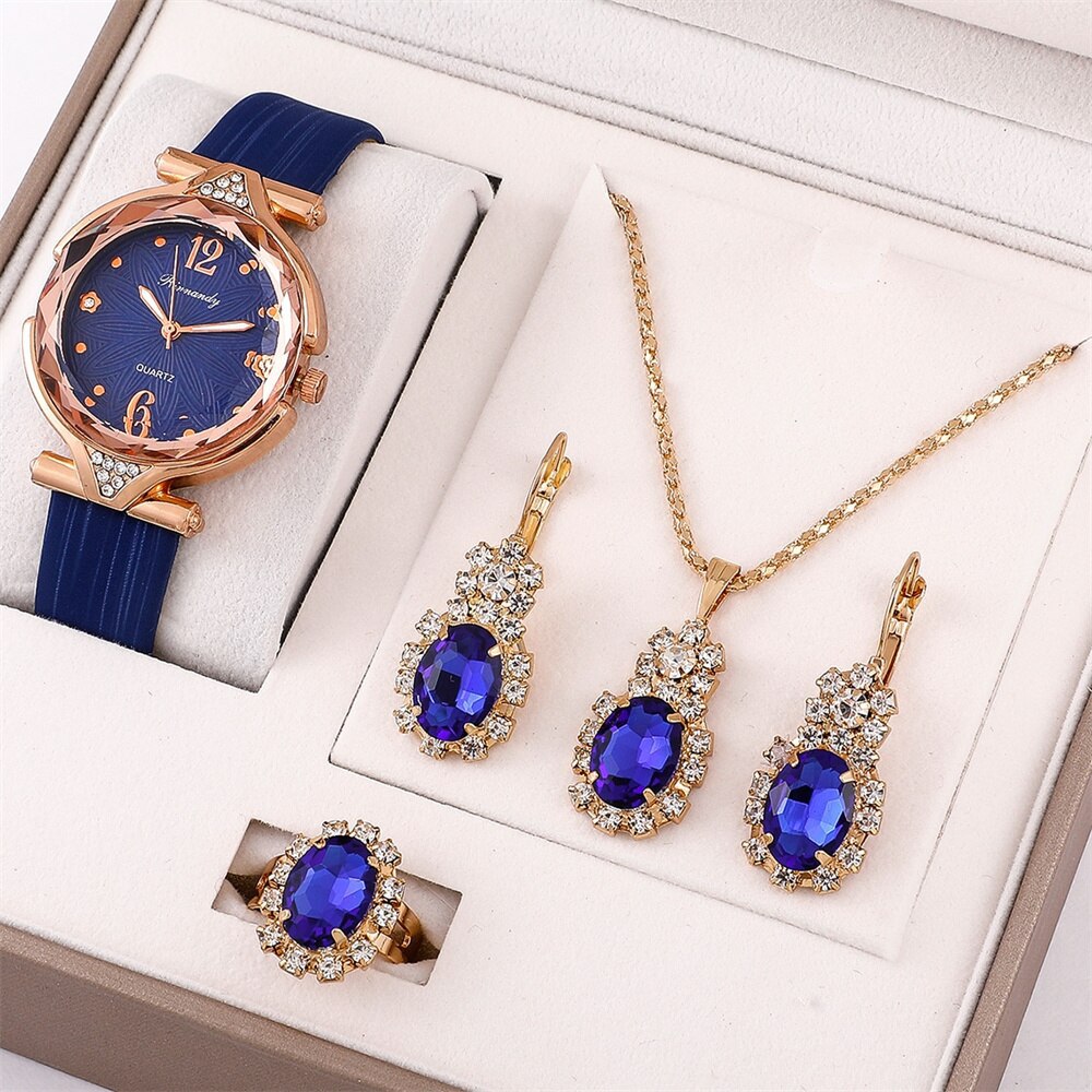 Divashine Jewelry Gift Set featuring a blue watch, necklace, earrings, and ring in elegant packaging
