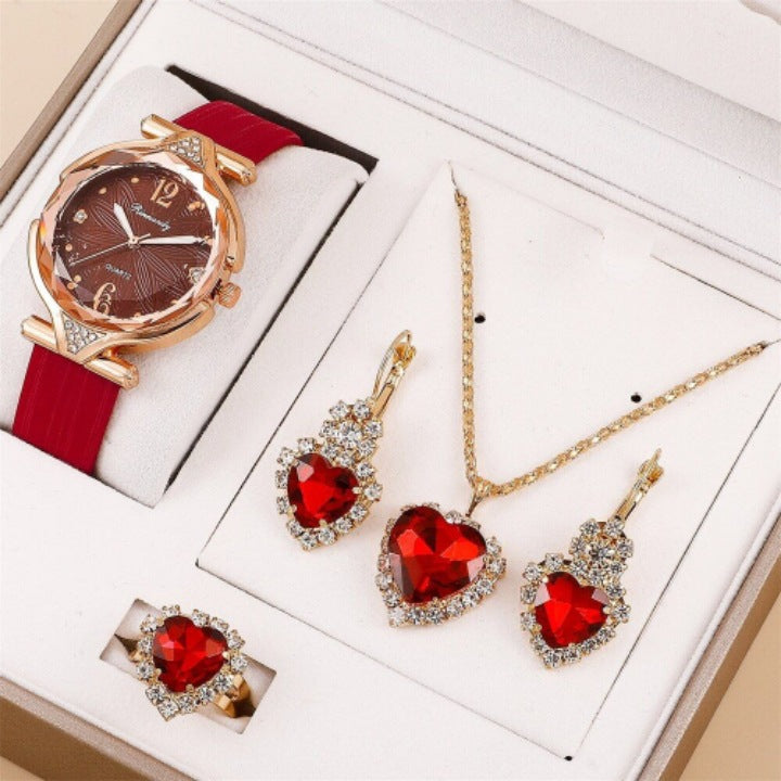 Divashine Jewelry Gift Set featuring a watch, necklace, earrings, and ring with red heart stones and gold accents