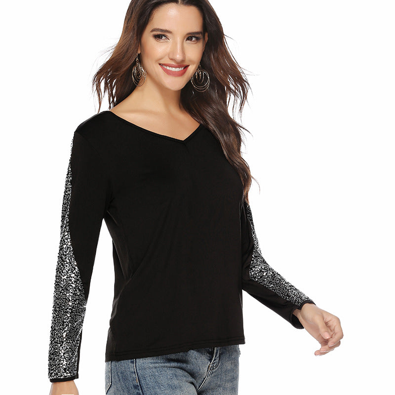 Stylish 3Sixty5 European glam sequin top with black body and shimmering sequin sleeves
