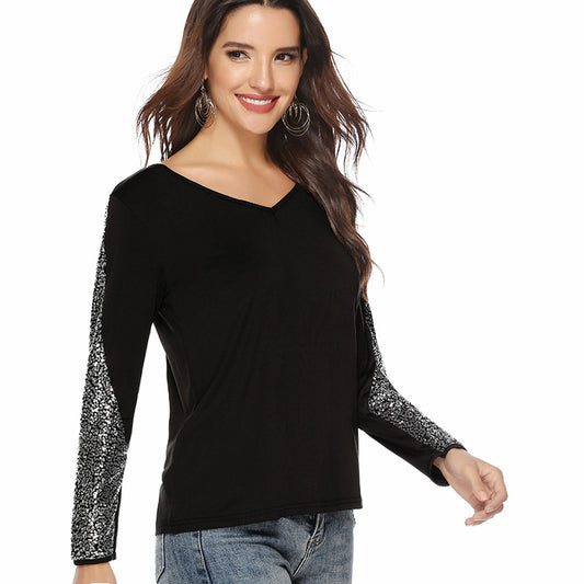 Stylish 3Sixty5 European glam sequin top with black body and shimmering sequin sleeves