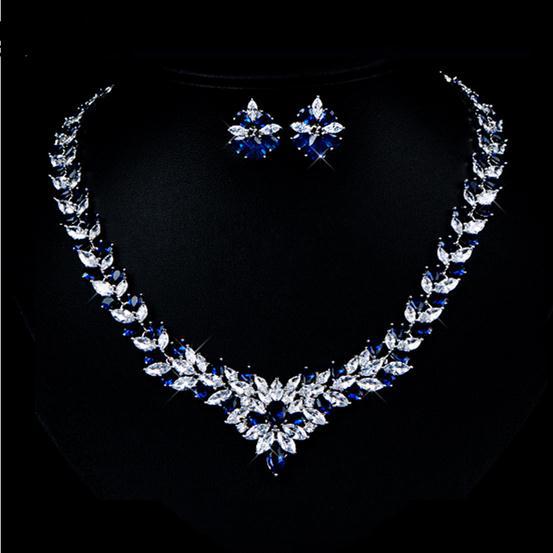Elegant floral zircon jewelry set featuring a stunning necklace and earrings with blue and clear gemstones