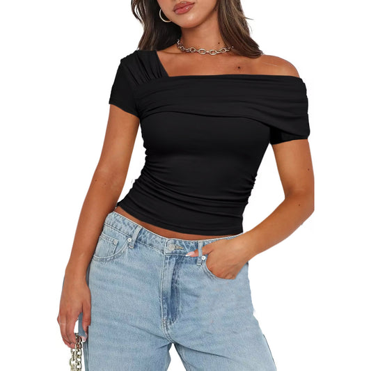 Chic black glow off-shoulder top from Stylish 3Sixty5 paired with high-waisted jeans for a trendy look