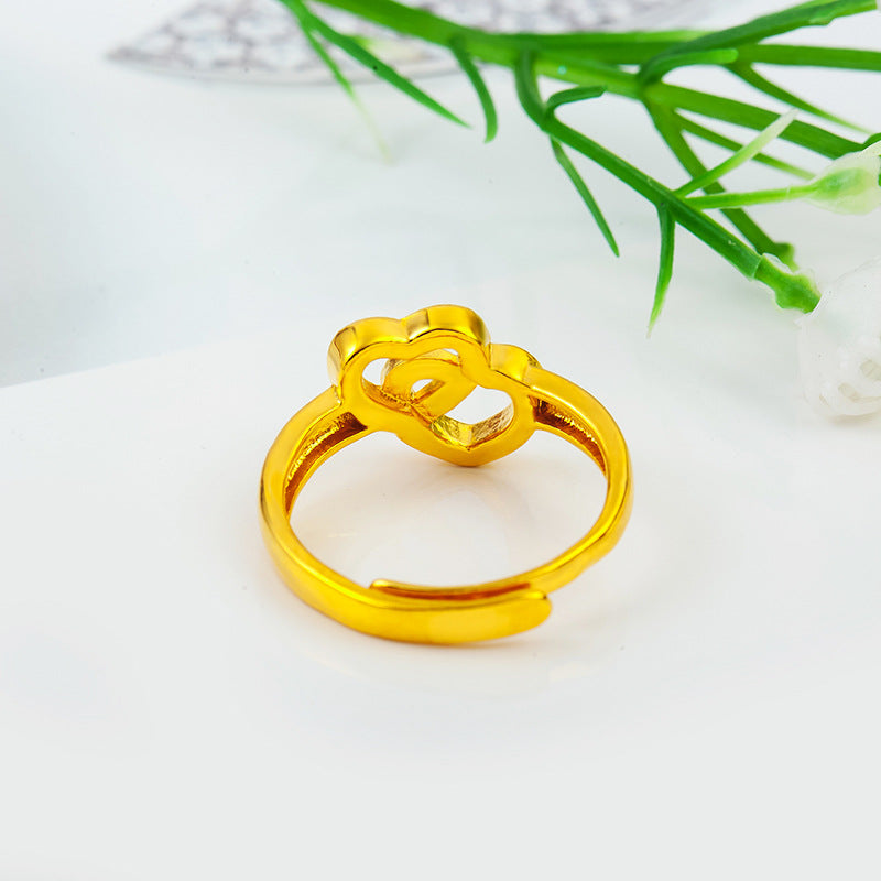 Stylish gold plated brass ring with a unique intertwined design for elegant accessorizing