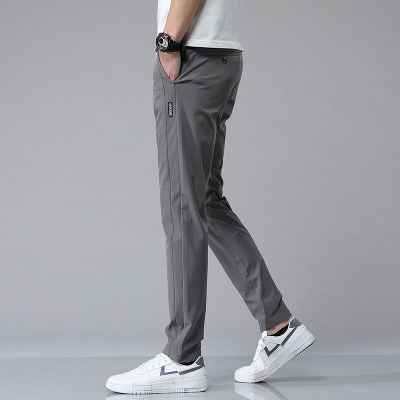 Gray ice silk men's casual pants from Stylish 3Sixty5 with a sleek design and pockets