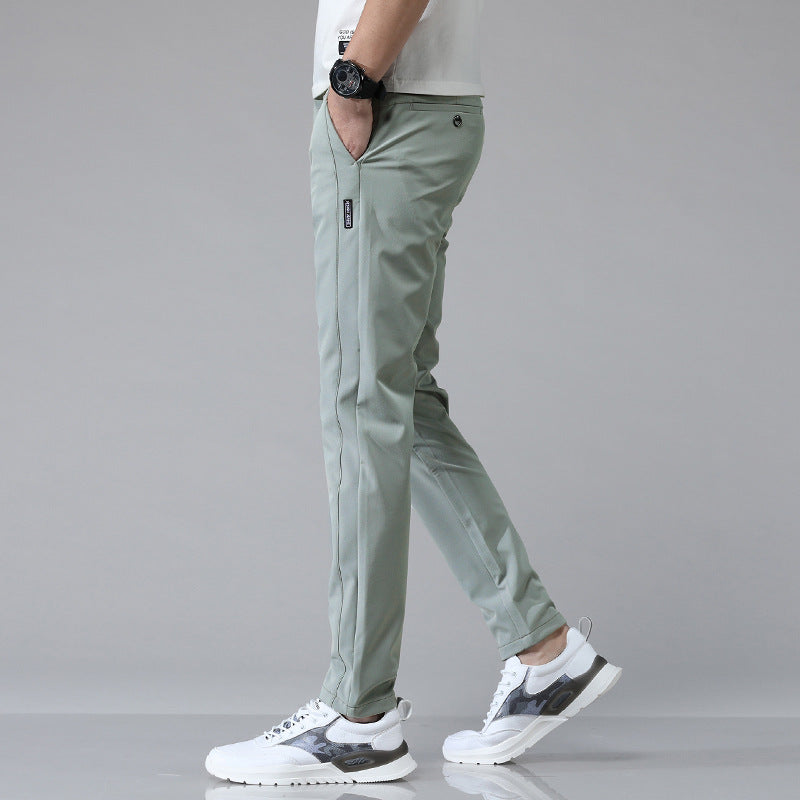 Stylish 3Sixty5 ice silk men's casual pants in light green color for comfortable everyday wear