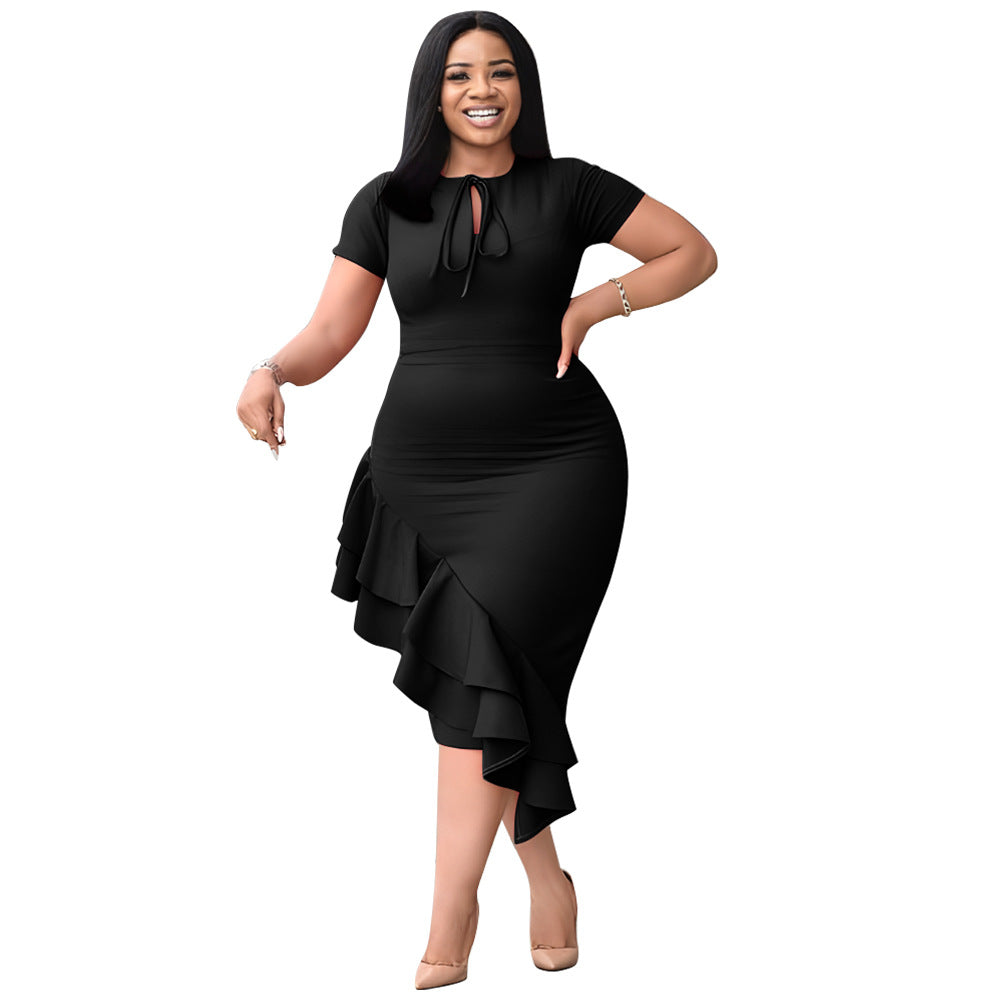 Stylish 3Sixty5 lotus leaf casual dress in black with ruffle hem and short sleeves