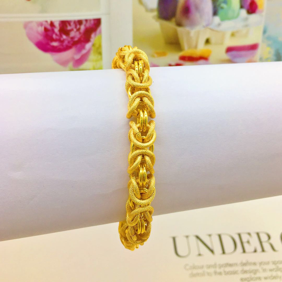 Stylish 3Sixty5 men's fashion statement bracelet with a unique braided design in gold tones