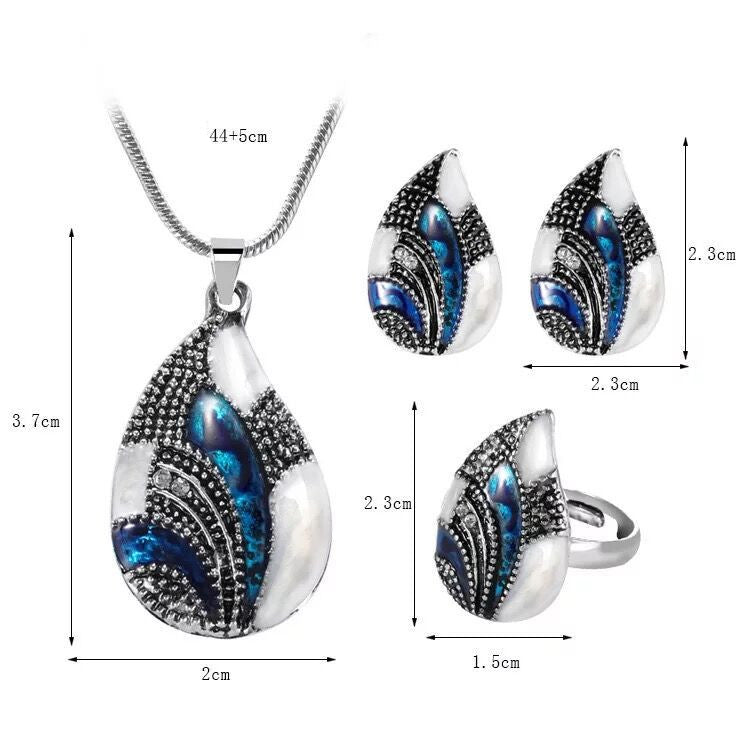 Ocean Mist Drop Jewelry Set featuring a pendant, earrings, and ring with blue and silver accents