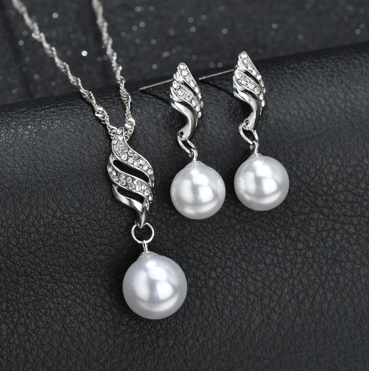 Stylish 3Sixty5 pearl jewelry gift set with a necklace and matching earrings featuring elegant designs