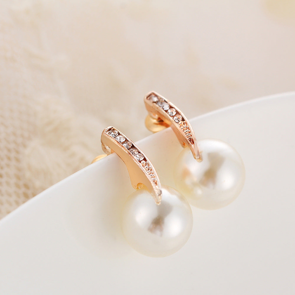 Elegant pearl luxe duo jewelry set featuring pearl earrings with sparkling accents in rose gold tone