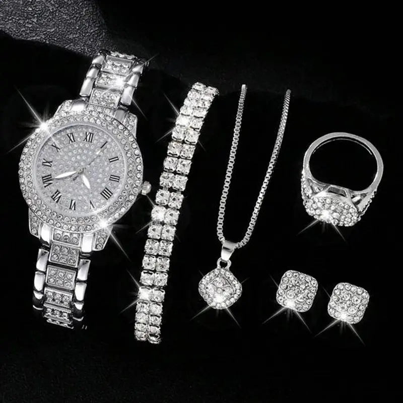 Elegant jewelry set featuring a Roman numeral watch for women, sparkling bracelets, necklace, ring, and earrings.