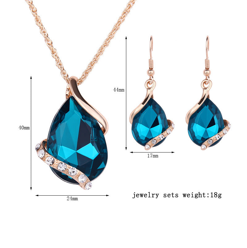 Stylish 3Sixty5 royal dewdrop jewelry set featuring a sparkling necklace and earrings with teal gems