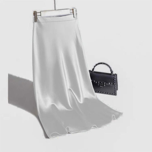 Stylish 3Sixty5 satin straight skirt in soft gray, perfect for elegant occasions and casual outings