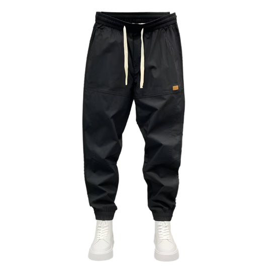 Stylish 3Sixty5 seasonal ankle jogger pants in black with adjustable drawstring and side pockets