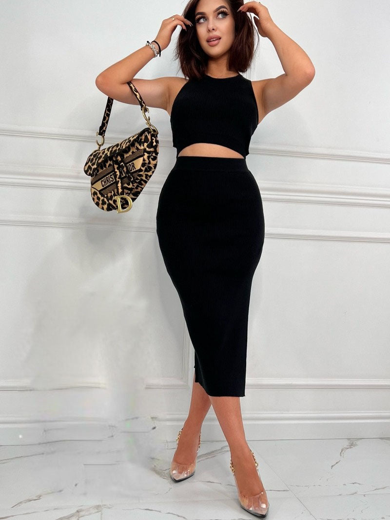 Stylish 3Sixty5 sharp & stunning suit set featuring a fitted crop top and sleek midi skirt in black
