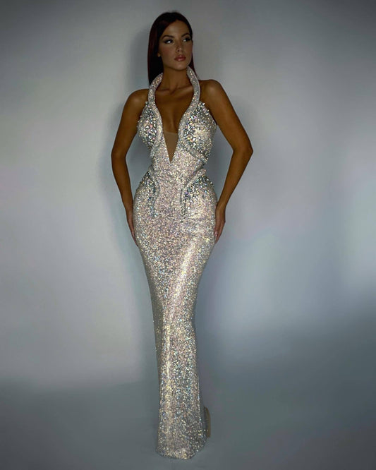 Sophisticated sequin sheath dress by Stylish 3Sixty5 featuring a deep plunge neckline and glamorous design