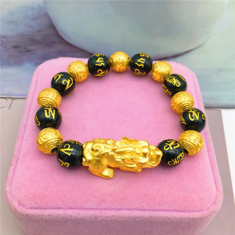 Stylish 3Sixty5 trendy gold bracelet with black beads and intricate lion design