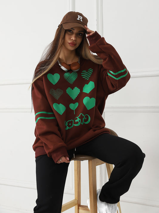 Stylish 3Sixty5 trendy heart sweater in brown with green heart patterns for a fashionable look