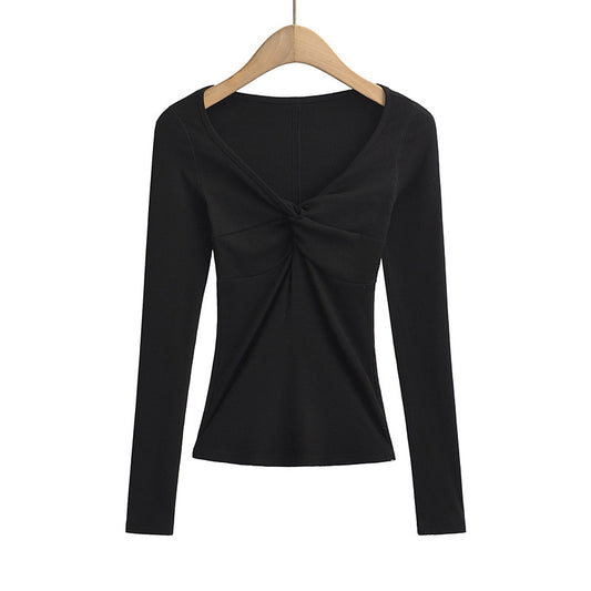 Stylish 3Sixty5 Twisted Allure French Crop Top in black with long sleeves and twisted front detail