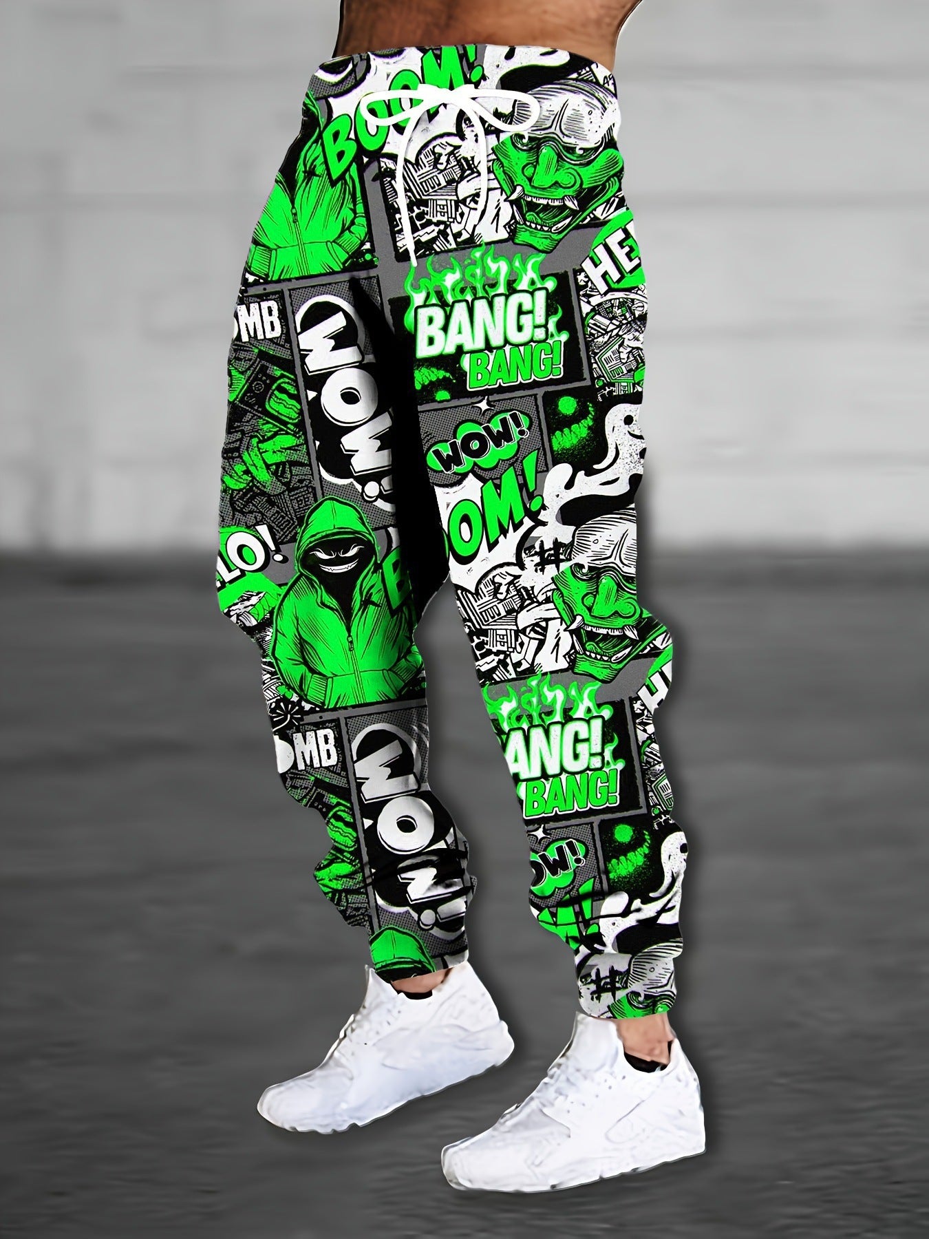 Vibrant print men's sweatpants featuring bold graphics in green and black for a stylish look