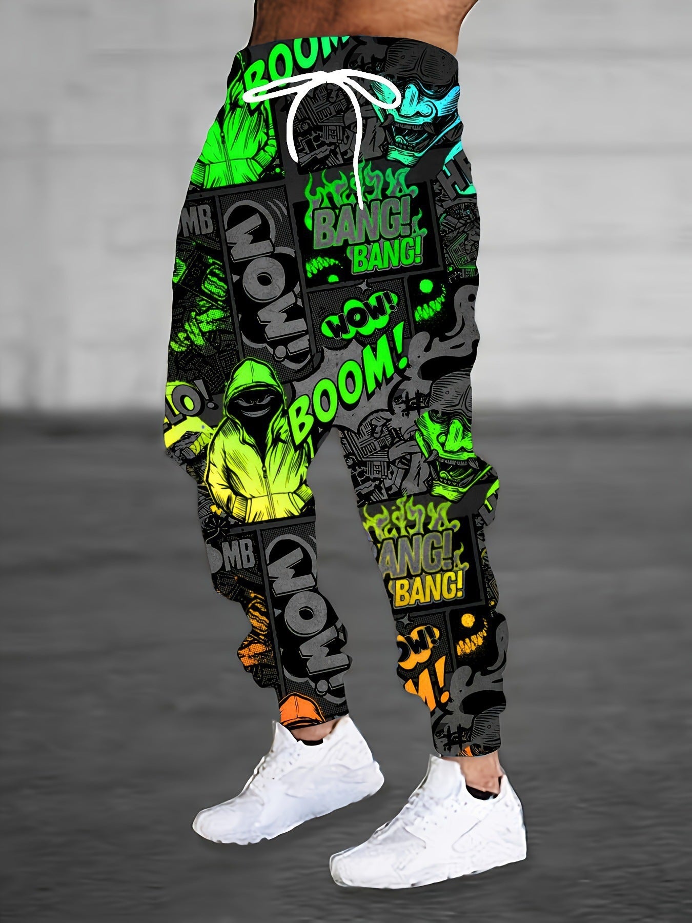 Vibrant print men's sweatpants featuring bold comic-inspired graphics and adjustable waist for comfort